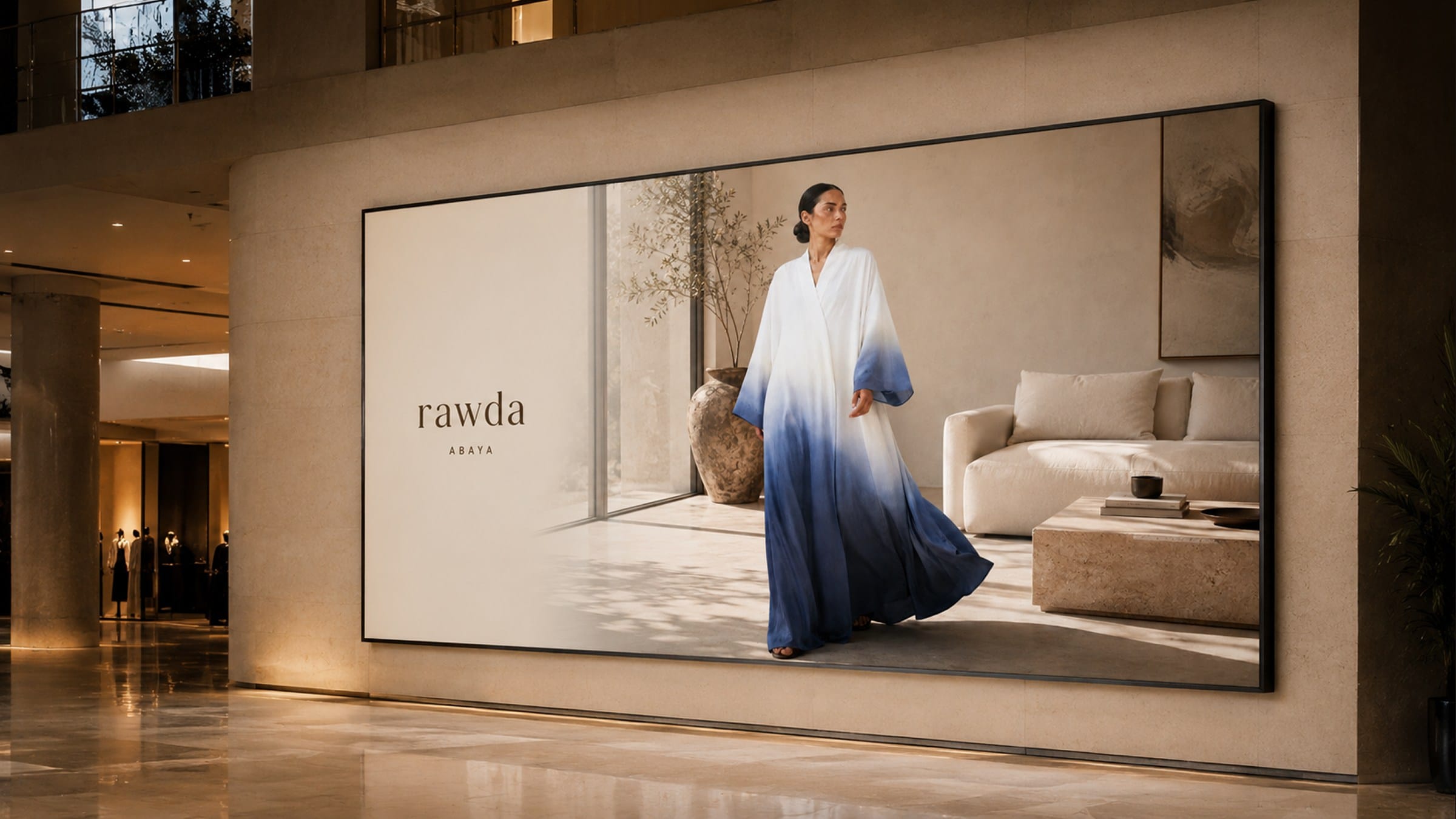 A lobby campaign wall showing a blue ombré abaya.