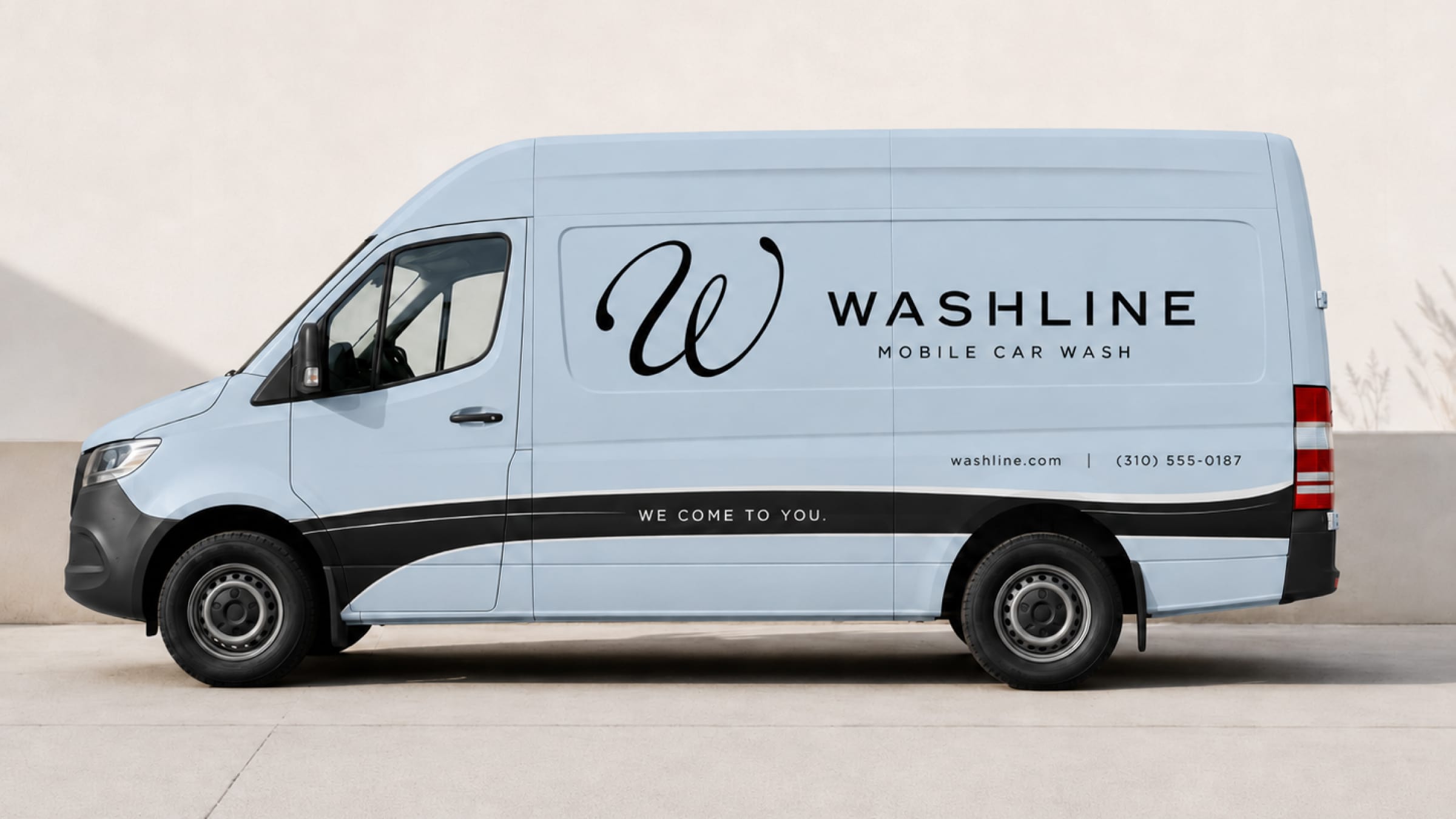 The Washline van in profile with its powder-blue livery.